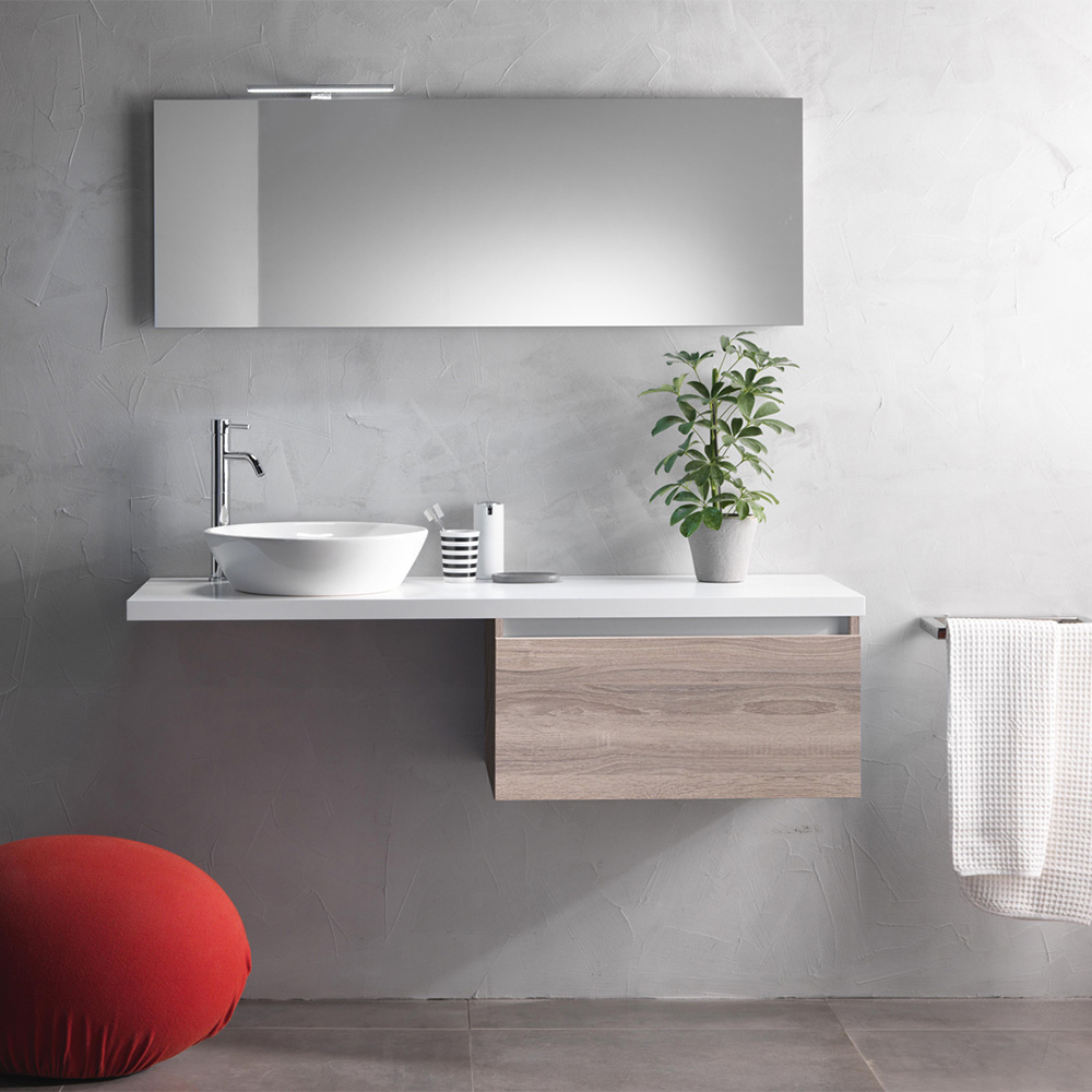 Mobile con lavabo da appoggio in ceramica